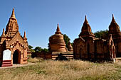 The cluster of red brick temples, named Khay-min-gha on the map on the North plain of Bagan. Myanmar. 